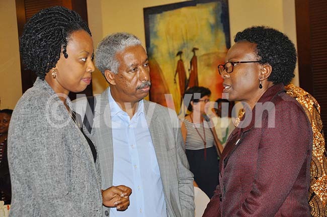   obinah ukwago hair health development partners onus egegn oldemariam  ountry representative to ganda and ane uth ceng inister of health interacting during a national dialogue on investing in health promotion at serena hotel on ovember 8 2019 hoto by ancy anyonga