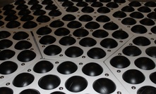 The Hexocover consists of floating hexagonal plastic panels that sandwich 10cm balls linked together to form a cover