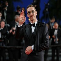 Turning injury into style: Benedict Cumberbatch walks Cannes red carpet with arm sling