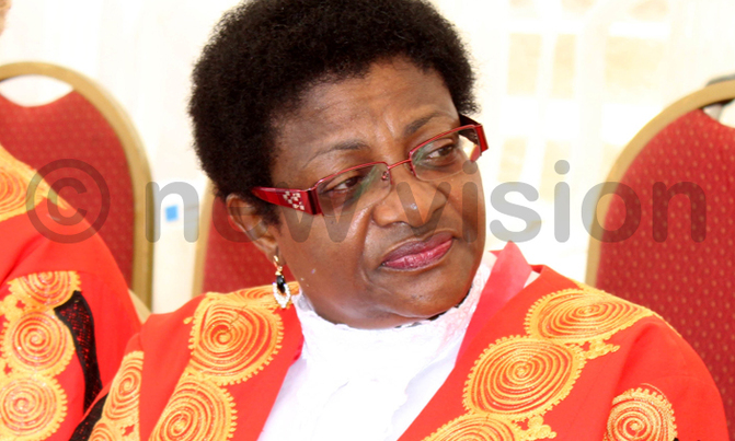 Judge dragged to court over land deal Judge dragged to court over land deal