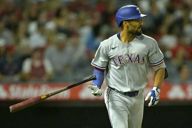 Seven-run inning propels Rangers past Angels