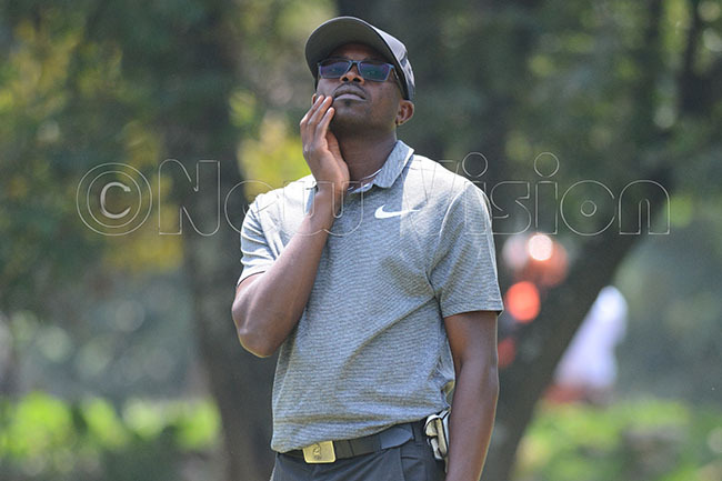  igerias che reacts to his putt on the 17th green