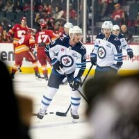 Jonathan Toews' first goal for Jets sparks comeback over Flames
