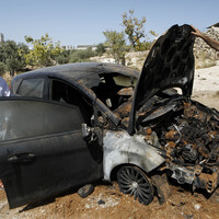 MIDEAST-WEST BANK-HEBRON-BURNED CAR