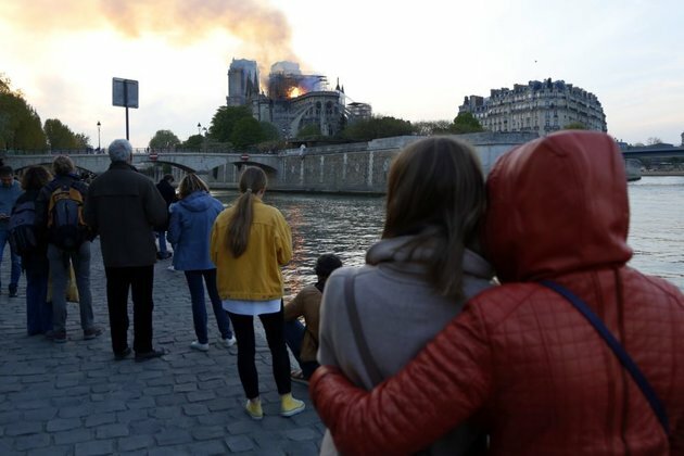 World Mourns Paris&#039; Fire-Damaged Notre Dame Cathedral