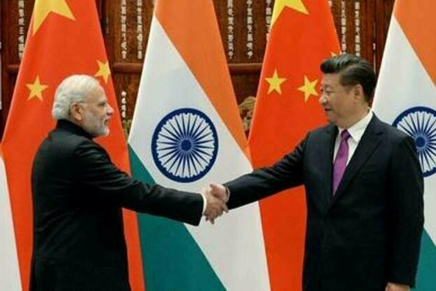 China-India relations have made 'positive progress' - Chinese foreign minister