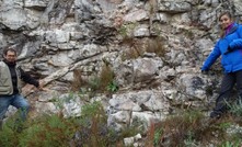  Latin's geologists point out a 2.5m-long spodumene crystal