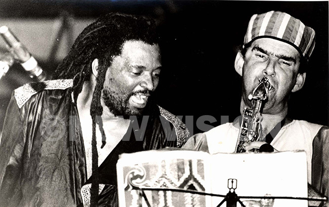  ucky ube eft and his saxaphonist performing at amboole tadium on ecember 6 1997