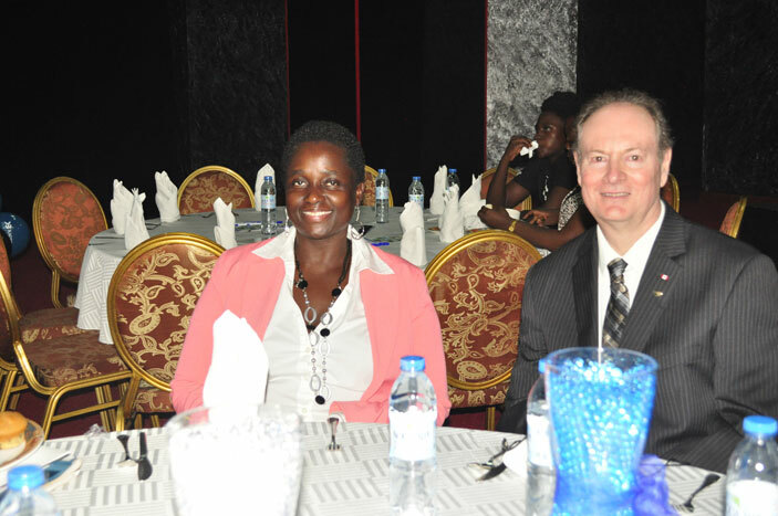  bina seated with one of the cofounders of  obal anagement