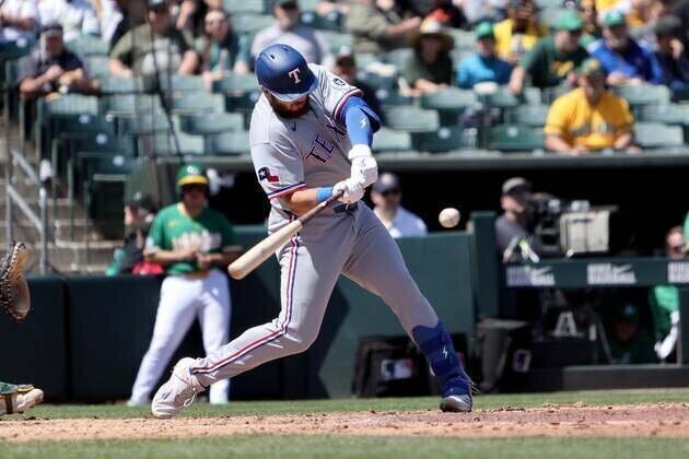 Rangers break out for big ninth inning, split series with A's