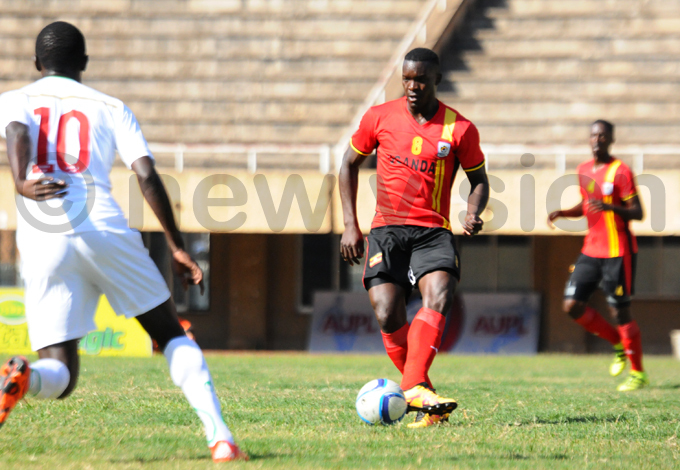  idfielder halid ucho plays a pass during the match hot by palanyi sentongo