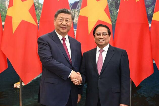 Xi calls on China, Vietnam to oppose hegemonism, unilateralism, protectionism