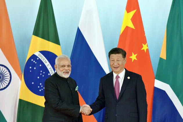 India planning to remove restrictions on Chinese firms  Reuters