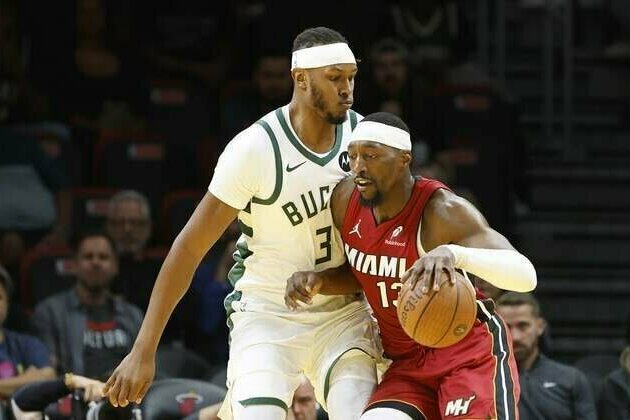 Heat hold on for sixth straight win at Bucks' expense
