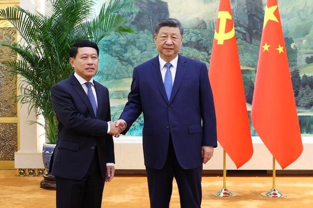 Xi's Album | Xi meets special envoy of Lao leader Thongloun