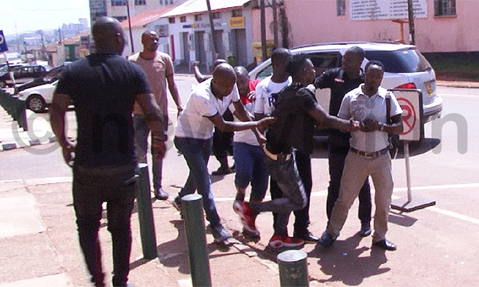 Musician charged with defaming rival Gravity Omutujju Musician charged with defaming rival Gravity Omutujju