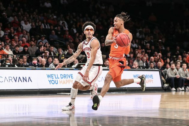 St. John's edges Syracuse in OT to win Empire Classic