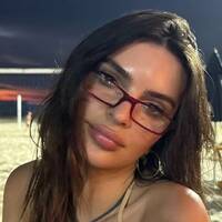 Emily Ratajkowski showcases stunning figure in stringy bikinis as she holidays in Brazil