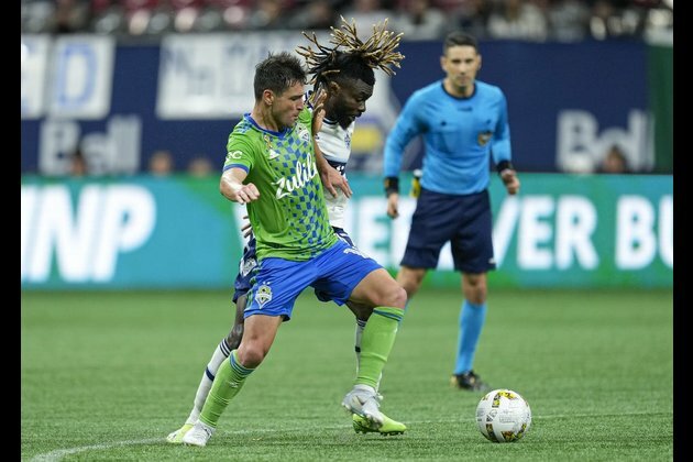 Whitecaps keep playoff hopes alive with win over Sounders