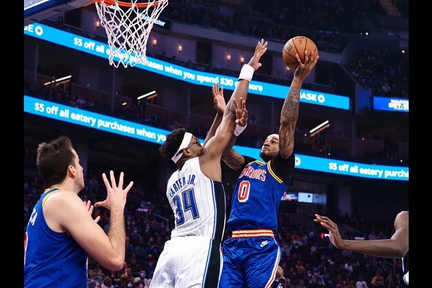 Long-range shooting carries Warriors past Magic