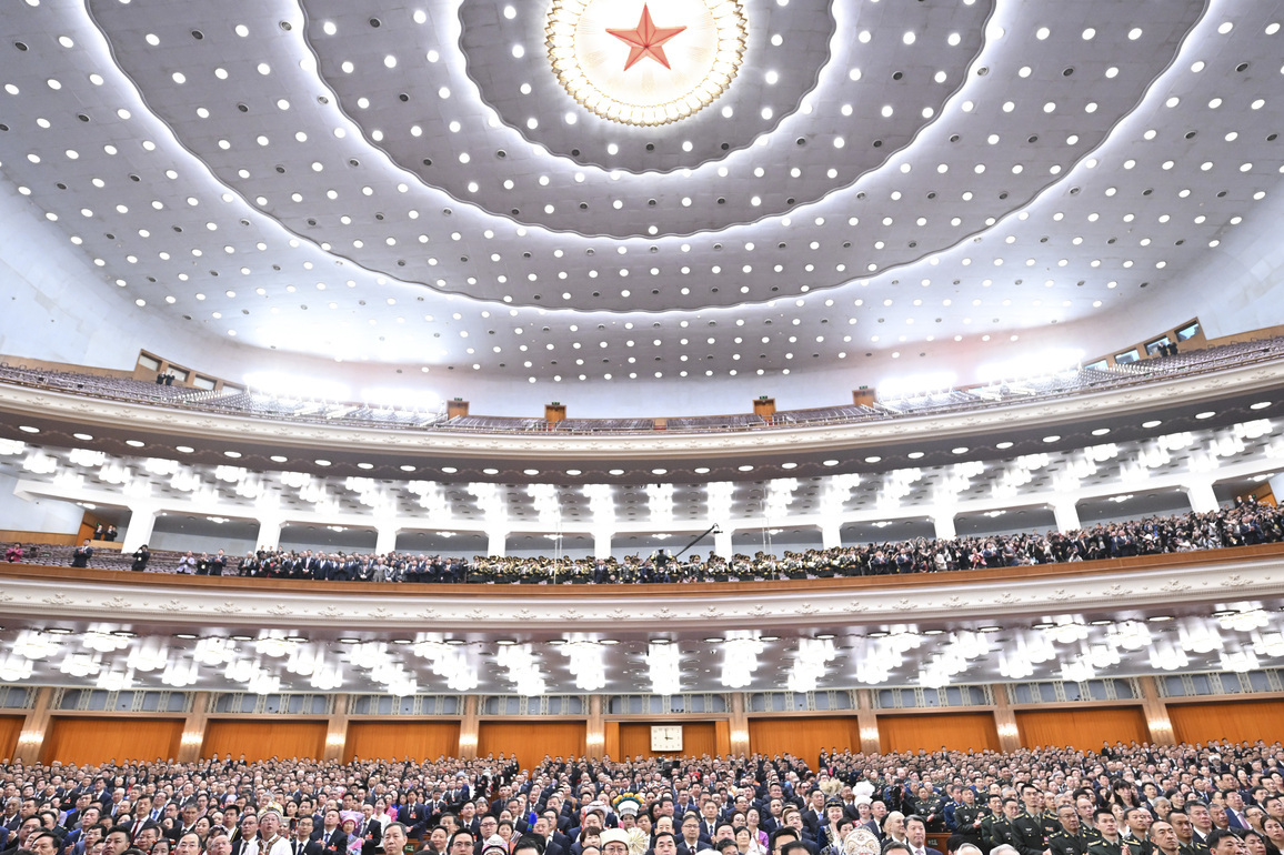 Photo Flash | China's national legislature holds closing meeting of annual session
