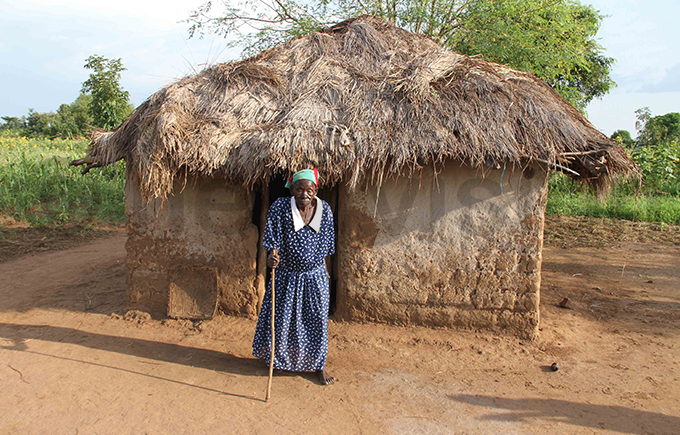  kullo stands outside her dilapidated hoto by udson punyo