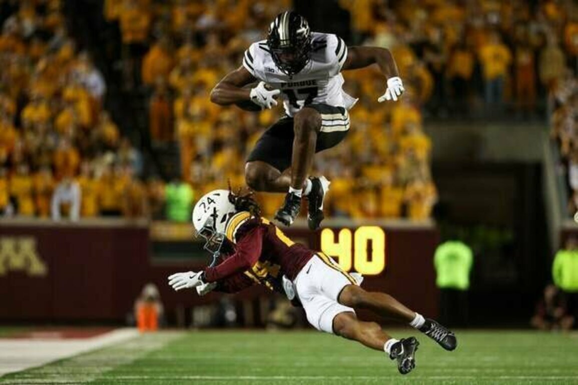 Minnesota caps rally with pick-six to upend Purdue