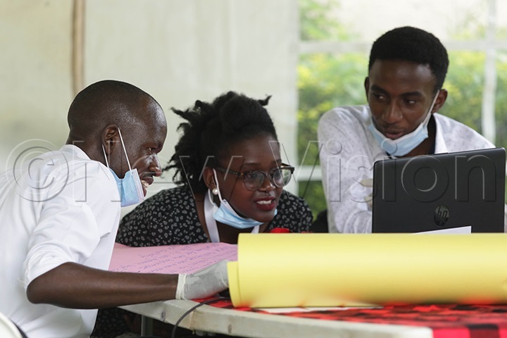 A group of innovators discussing during during the competition