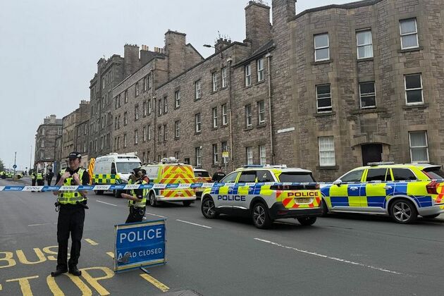 Riot police cordon off Edinburgh street as residents evacuated from homes in major incident