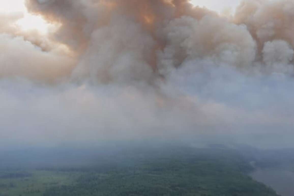 Smoke blankets Alberta as fight against western wildfires continues