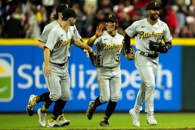 MLB roundup: Pirates escape 9-run hole, stun Reds