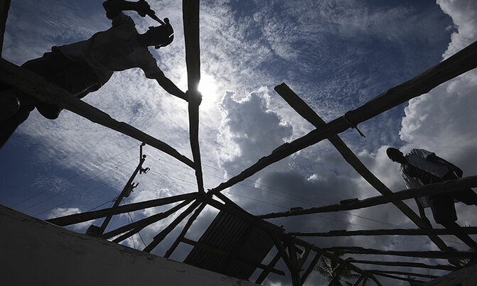 Haitians rebuild as aid effort gains traction Haitians rebuild as aid effort gains traction