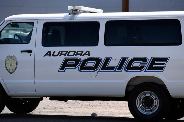 Woman killed crossing road in Aurora hit-and-run crash near bus stop