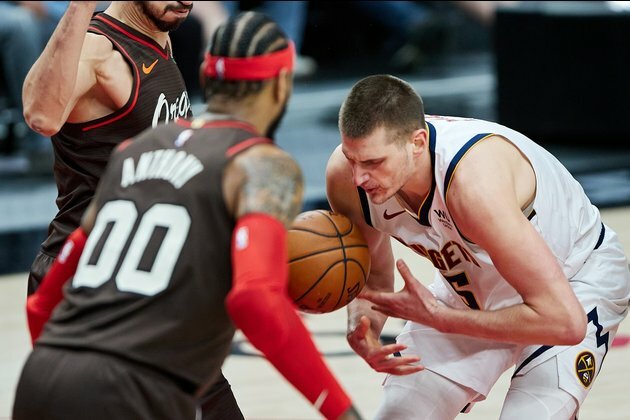 Blazers knock off Nuggets, clinch playoff berth