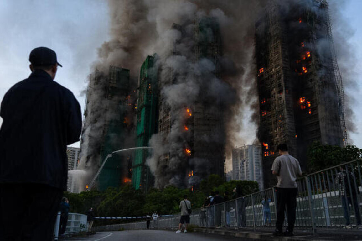 Dozens killed as fire engulfs Hong Kong high-rise residential blocks