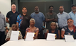 Sheffield, Arma Legal and Traditional Owner representatives with the signed Co-existence Agreement 