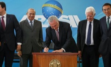 Brazil president Michel Temer signs the decrees