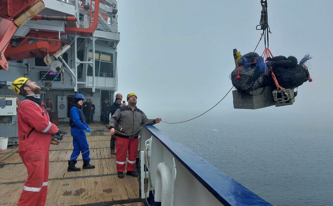 Antonia Thielecke (in blue)/Alfred Wegener Institute leading the operation on board the German icebreaker RV Polarstern. Credit Gianluca Volpe