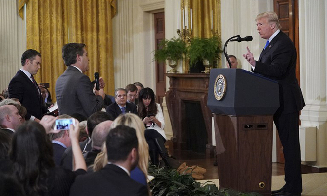 White House bars CNN reporter after heated Trump exchange White House bars CNN reporter after heated Trump exchange