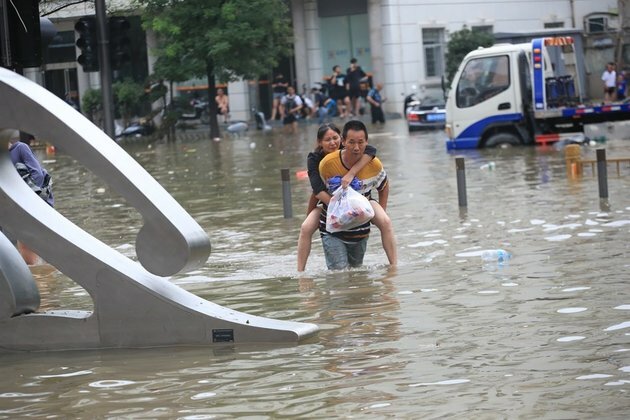 Death toll in central China floods rises to 302, 50 missing
