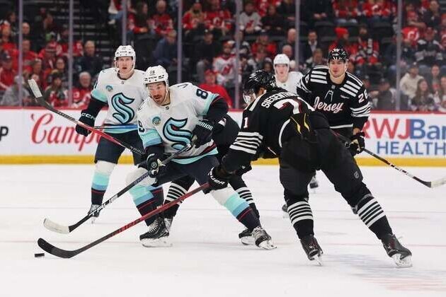 Unable to hold two leads, Devils sink Kraken in OT