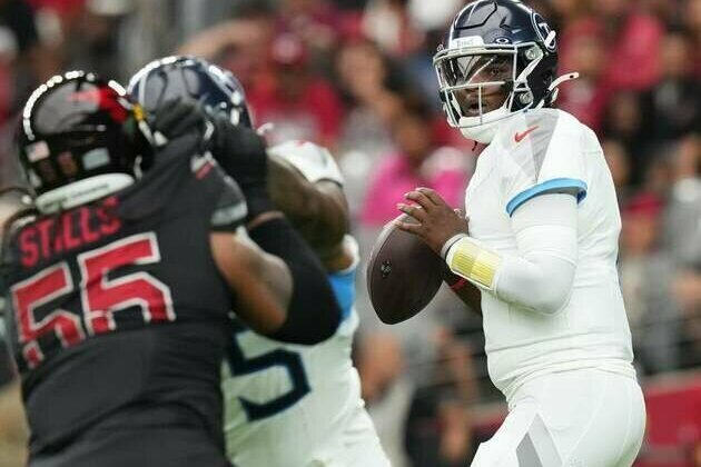 Titans pull off remarkable late rally to beat Cardinals for first win