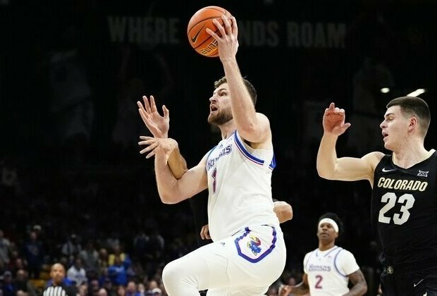 Hunter Dickinson erupts for 32 points to push Kansas past Colorado