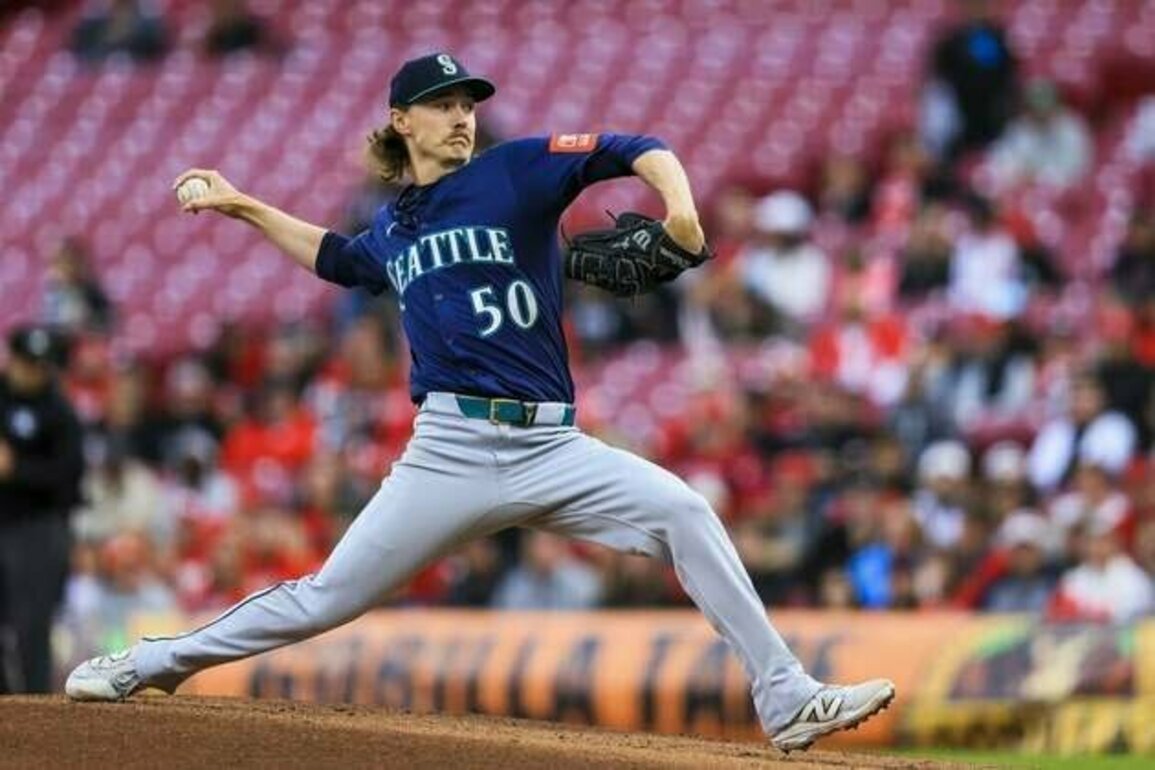 Cal Raleigh homers twice to back Bryce Miller as Mariners top Reds