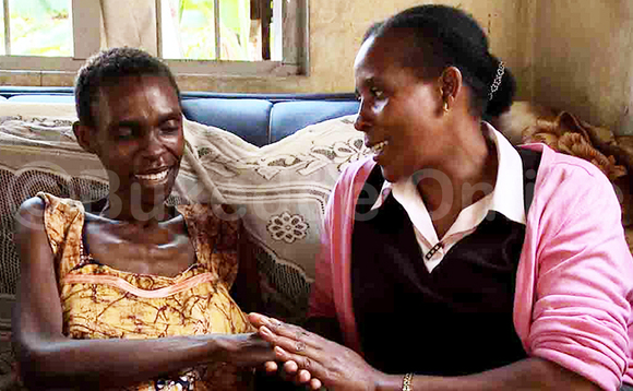 Joyce alina akawuka ka siriimu ne kookolo ngali n'omusawo Charlotte Komunda owa Palliative Care Association Uganda Ekif. Palliative Care Association Uganda Joyce alina akawuka ka siriimu ne kookolo ngali n'omusawo Charlotte Komunda owa Palliative Care Association Uganda Ekif. Palliative Care Association Uganda