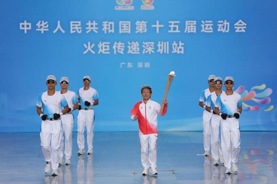 InPics|First-ever cross-boundary torch relay held for China's National Games
