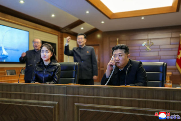 Kim Jong Un watches cruise missile tests with teenage daughter