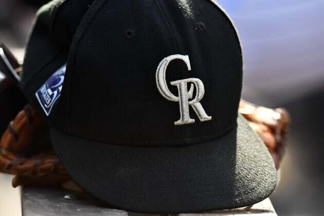 Broncos ownership buys reported 40% stake in Rockies