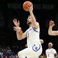 Hunter Dickinson erupts for 32 points to push Kansas past Colorado