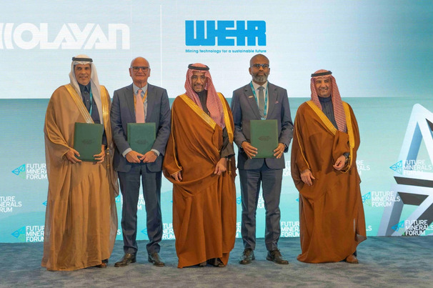 Representatives from Weir & Olayan pictured on stage at the Future Minerals Forum in Riyadh.